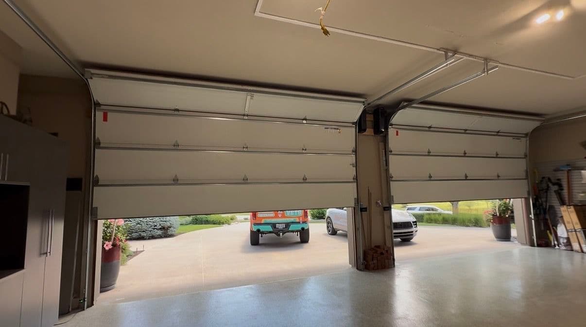 Gallery photos for High-Lift Garage Door Conversion That Actually Unlocks Overhead Space: Image #1