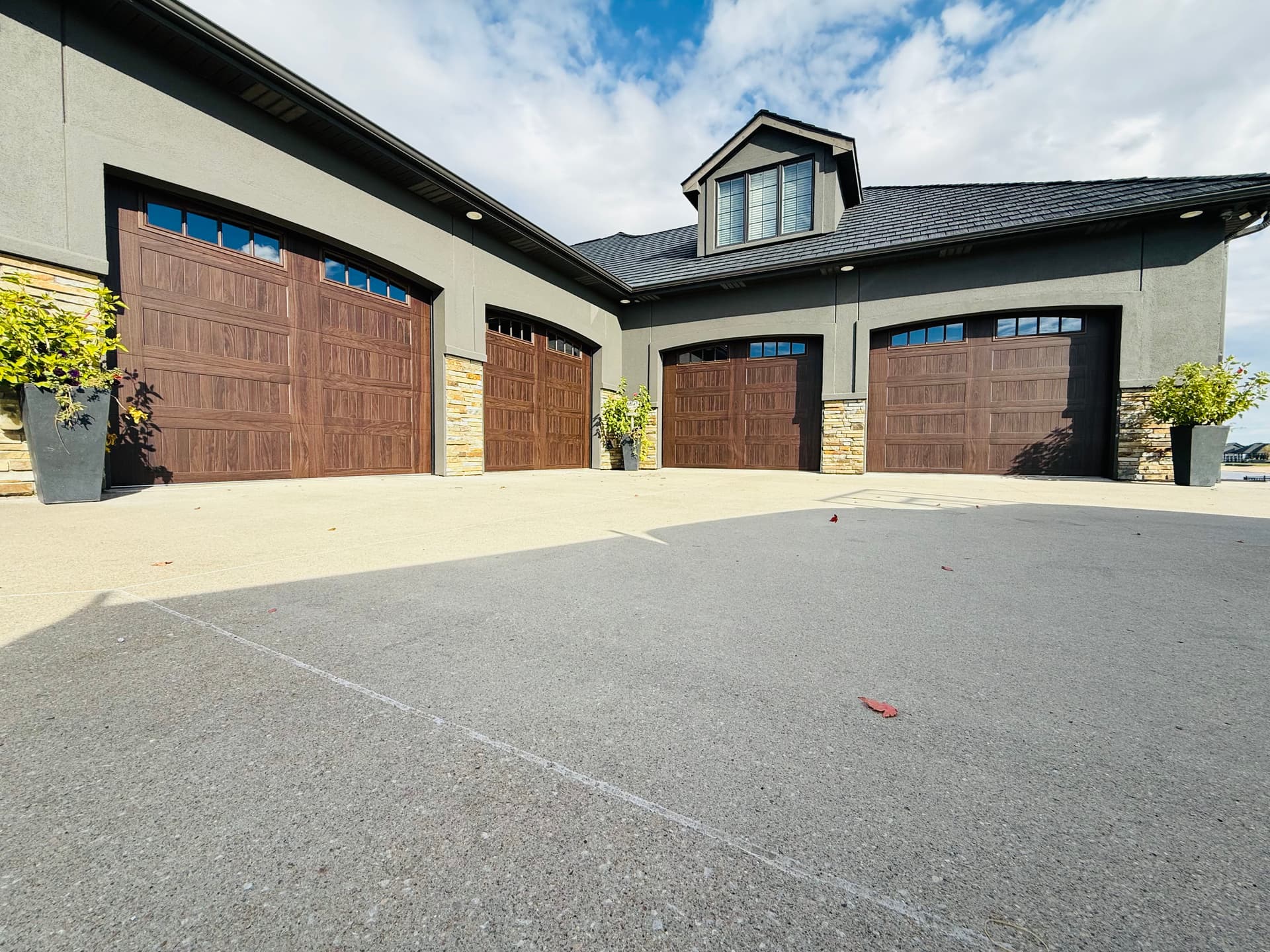 Four CHI Garage Doors That Completely Changed This Home's Front Face image